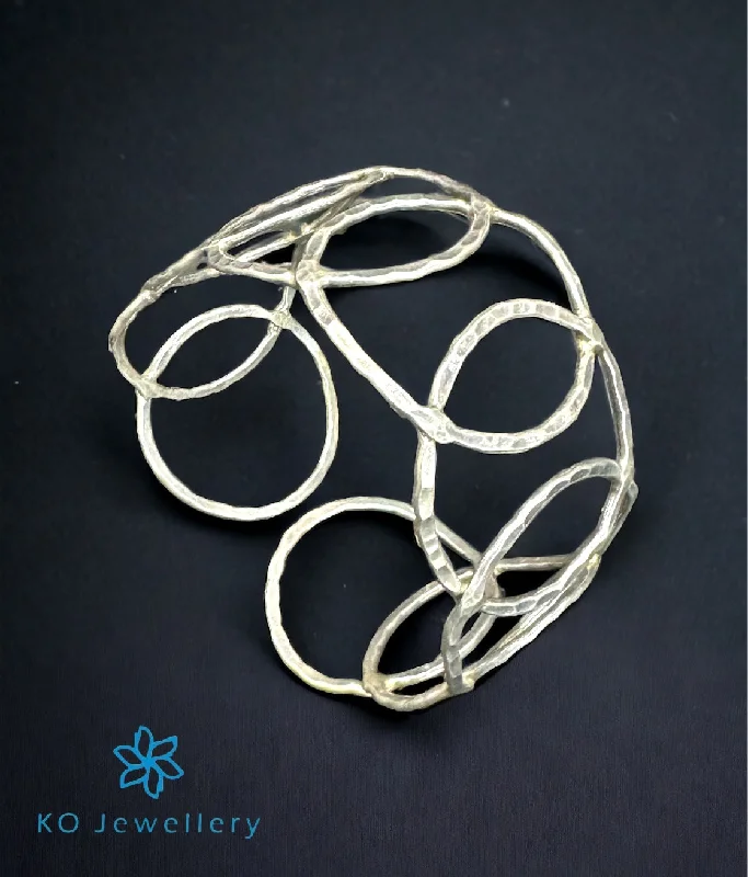 Dove motif bangles-The Circled Silver Flexible Open Bracelet