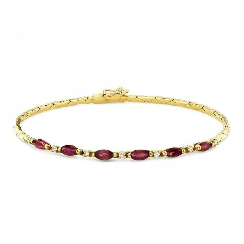 Topaz cut engagement rings-18ct Yellow gold Ruby & Diamond Bracelet