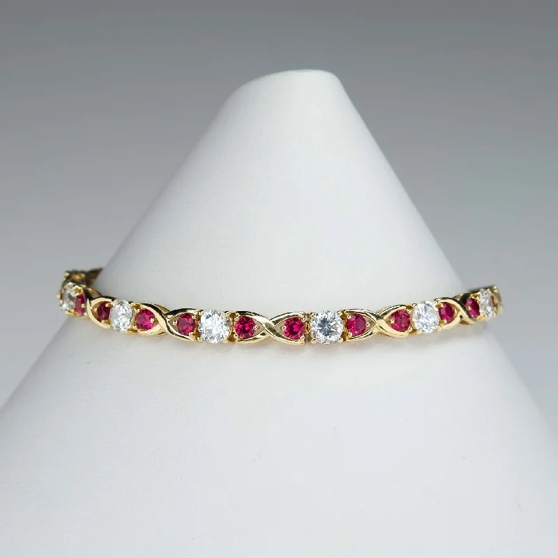 Ruby bead bangles-Cubic Zirconia and Red Spinel "X"Link Tennis Bracelet is 14K Yellow Gold