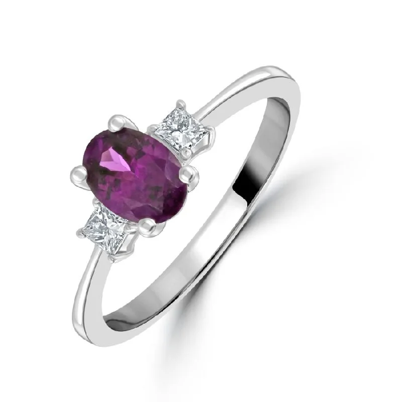 Bold halo engagement rings-18ct White Gold Oval Purple Garnet & Diamond Trilogy Ring